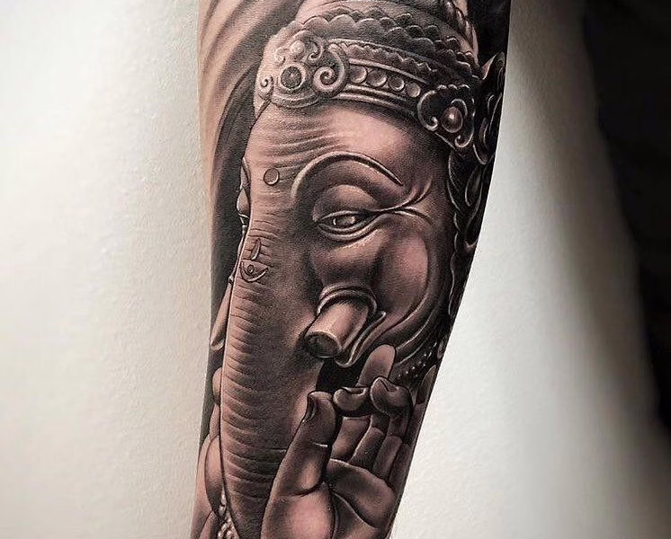 elefante budista tatuaje