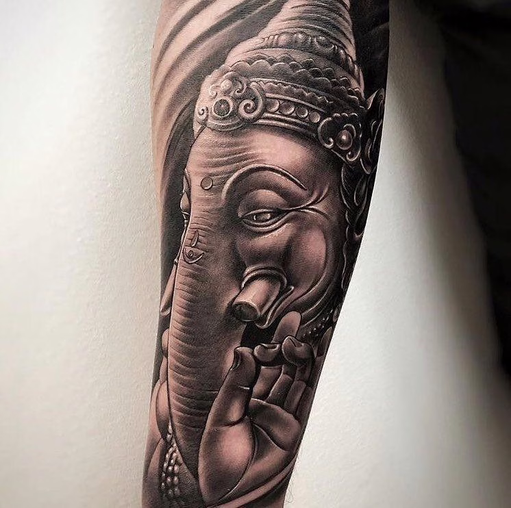 elefante budista tatuaje
