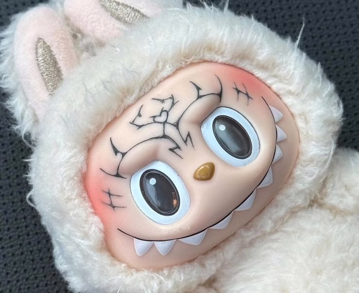 tattooed labubu